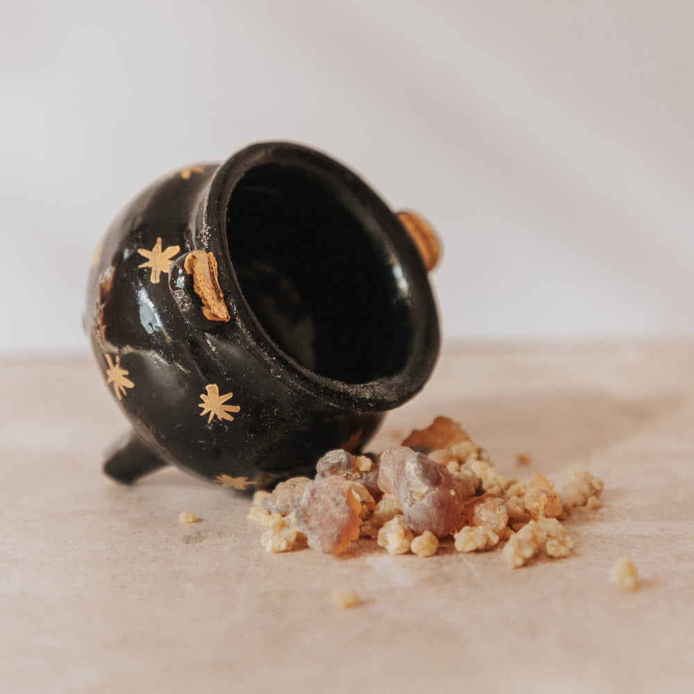 Handmade ceramic cauldron from Quintana Roo, Mexico, is used as copalera. Its expert craftsmanship and earthy aesthetic pay homage to the region's cultural heritage. Designed for burning copal resin, it exudes a fragrant, spiritual ambiance, making it a cherished piece of cultural significance.